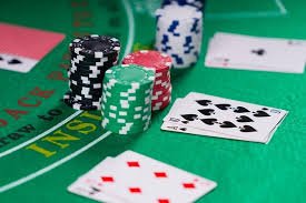 Filipino player reviewing jackpot game categories and prize details on luckyi